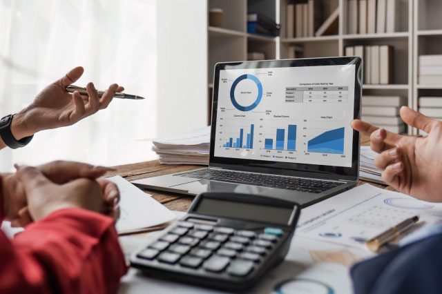 Business team meeting present.professional investor working with new startup project. Finance managers task.Digital tablet laptop computer design smart phone in office. Business team meeting present.professional investor working with new startup project. Finance managers task.Digital tablet laptop computer design smart phone in office